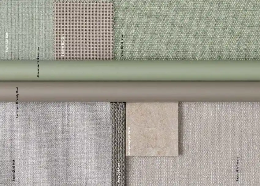 Stoffmuster in Grüntönen mit unterschiedlichen Texturen und Oberflächen, belegt auf einer Pflaster- oder Arbeitsfläche, zeigt textile Muster und Paneelmaterialien